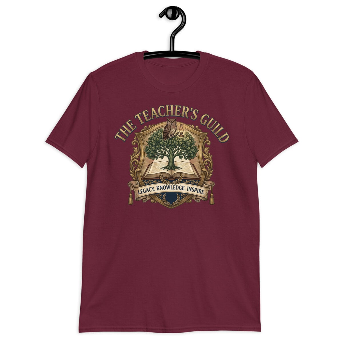 Navy Vintage Teacher T-Shirt with an owl, open book, growing tree, and academic guild crest