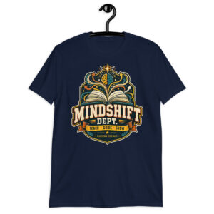 Male teacher wearing a black Mindshift Dept Teacher T-Shirt in a classroom