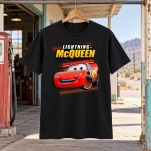 Black Lightning McQueen Shirt featuring the red Cars racer, yellow McQueen lettering, racing stripes, and halftone details.